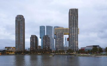 Небоскрёб, похожий на саксофон, увенчан эффектным крытым мостом